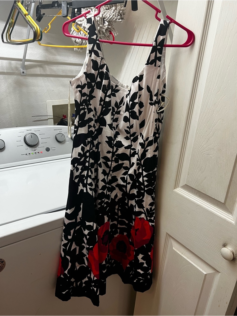 Black & White Floral Sleeveless Dress with Red Accent